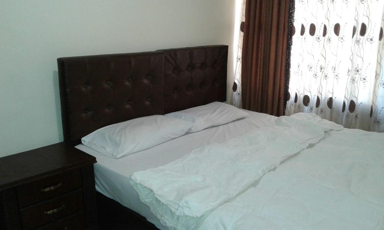 Al Tawheed Hotel Apartments Amman Eksteriør bilde